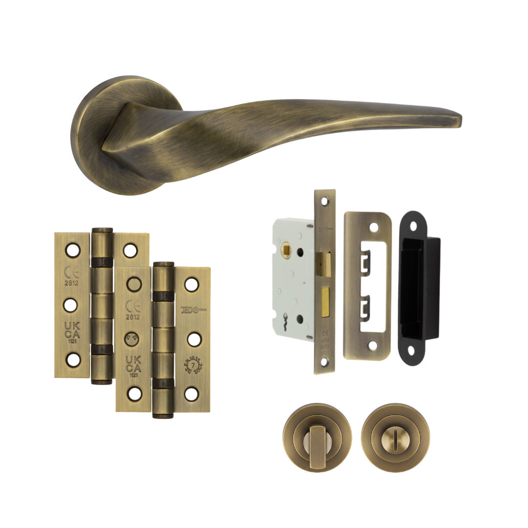 Chelsea antique brass door handle with hinges, bathroom lock and thumb turn