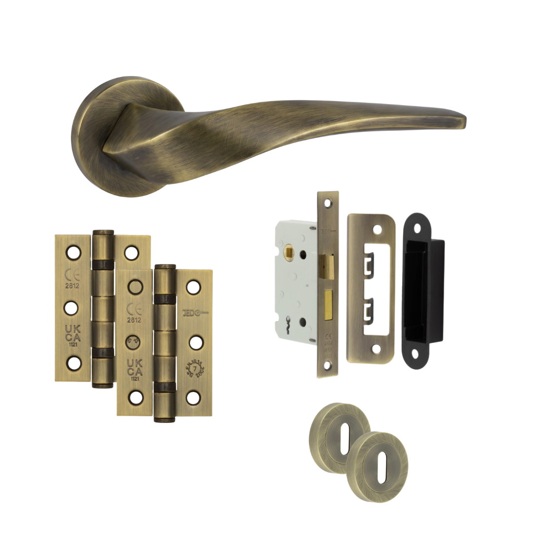 Chelsea antique brass door handle with hinges, mortice lock and keyhole escutcheons