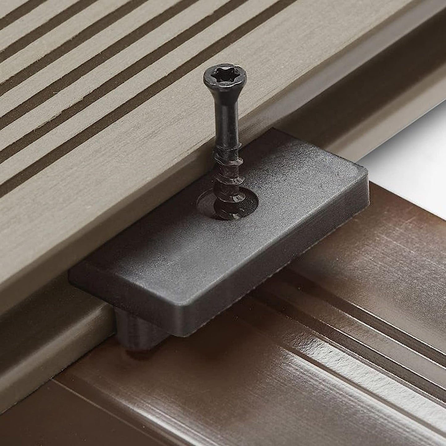 Composite decking fittings - hidden fixing clips