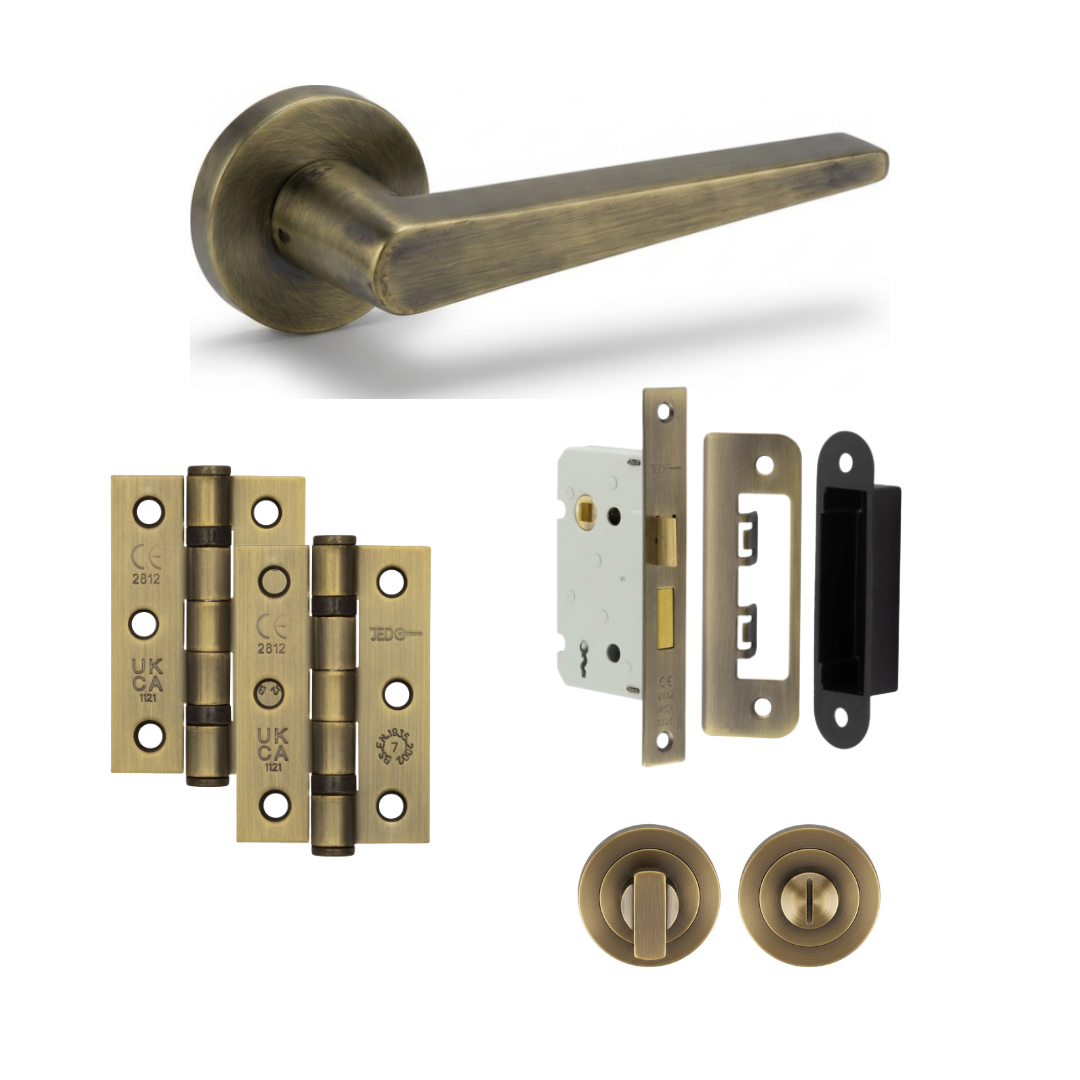 Lisbon antique brass door handle with hinges, bathroom lock and thumb turn