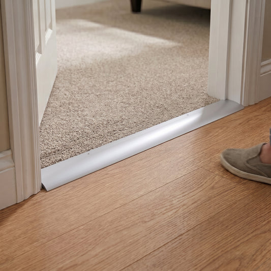 Screw-down aluminium reducer and flat door threshold profile