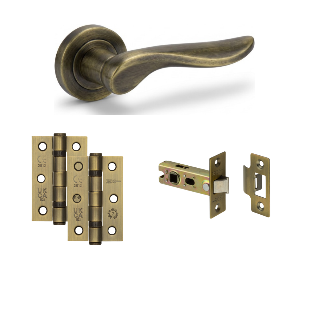 Venice antique brass door handle with antique brass hinges and tubular latch