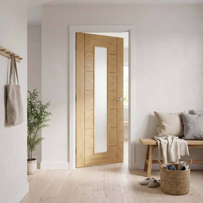 WC19GF oak contemporary internal door with frosted glass, fitted in a hallway