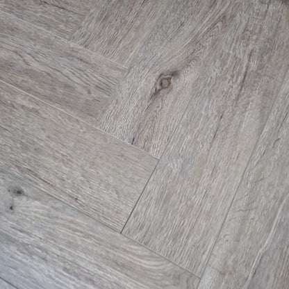Washed Oak Herringbone Laminate Flooring 12mm